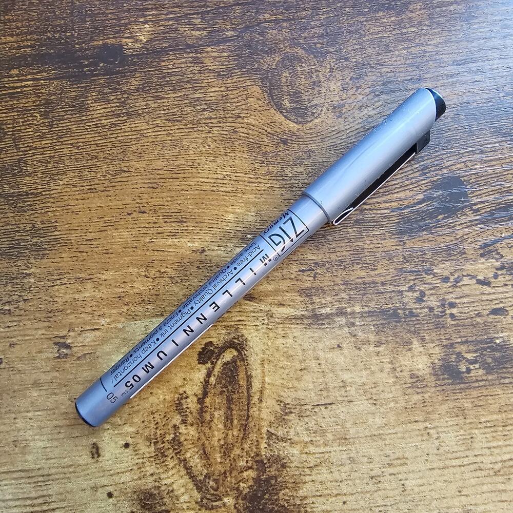 Kuretake Zig Memory System Millennium fineliner pen with a silver barrel
